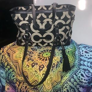 Black and grey fabric/leather lined Coach handbag